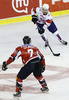 Anze Kopitar (no.11) of Slovenia (R) and Stefan Ulmer (no.7) of Austria (L) during match of EIHC Ice hockey tournament between Slovenia and Austria. Match between Slovenia and Austria was held in Ljubljana Hala Tivoli arena, Slovenia, on Saturday, 10th of November 2012.
