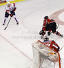 Jan Mursak (no.39) of Slovenia (L) in front of goalie Bernhard Starkbaum (no.29) of Austria during match of EIHC Ice hockey tournament between Slovenia and Austria. Match between Slovenia and Austria was held in Ljubljana Hala Tivoli arena, Slovenia, on Saturday, 10th of November 2012.
