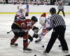 Manuel Geier (no.88) of Austria (L) and Anze Kopitar (no.11) of Slovenia (R) in bully fighting for puck during match of EIHC Ice hockey tournament between Slovenia and Austria. Match between Slovenia and Austria was held in Ljubljana Hala Tivoli arena, Slovenia, on Saturday, 10th of November 2012.
