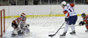 Anze Kopitar (no.11) of Slovenia (R) in front of goalie Bernhard Starkbaum (no.29) of Austria (L) during match of EIHC Ice hockey tournament between Slovenia and Austria. Match between Slovenia and Austria was held in Ljubljana Hala Tivoli arena, Slovenia, on Saturday, 10th of November 2012.
