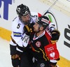 Lasse Kukkonen (Karpat Oulu) and Rafael Rotter (UPC Vienna Capitals) during the Champions Hockey League match between UPC Vienna Capitals and Karpat Oulu at the Albert Schultz Ice Arena, Vienna, Austria on 2014/11/11.
