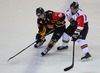 Nikolaus Hartl (UPC Vienna Capitals) and Sakari Manninen (Karpat Oulu) during the Champions Hockey League match between UPC Vienna Capitals and Karpat Oulu at the Albert Schultz Ice Arena, Vienna, Austria on 2014/11/11.
