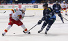 Linus Omark (no.67) of Jokerit Helsinki (L) and Andrew Hutchinson (no.24) of KHL Medvescak (R) during match of fore last round of Ice hockey KHL, Kontinental Hockey League, between KHL Medvescak Zagreb and Jokerit Helsinki. KHL ice hokey match between KHL Medvescak Zagreb, Croatia, and Jokerit Helsinki, Finland, was played in Dom Sportova Arena in Zagreb, Croatia, on Sunday, 22nd of February 2015.
