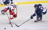 Riku Hahl (no.32) of Jokerit Helsinki (L) and Brandon Segal (no.12) of KHL Medvescak (R) during match of fore last round of Ice hockey KHL, Kontinental Hockey League, between KHL Medvescak Zagreb and Jokerit Helsinki. KHL ice hokey match between KHL Medvescak Zagreb, Croatia, and Jokerit Helsinki, Finland, was played in Dom Sportova Arena in Zagreb, Croatia, on Sunday, 22nd of February 2015.
