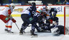 Semir Ben-Amor (no.18) of Jokerit Helsinki, Goalie Cal Heeter (no.34) of KHL Medvescak during match of fore last round of regular season Ice hockey KHL, Kontinental Hockey League, between KHL Medvescak Zagreb and Jokerit Helsinki. KHL ice hokey match between KHL Medvescak Zagreb, Croatia, and Jokerit Helsinki, Finland, was played in Dom Sportova Arena in Zagreb, Croatia, on Sunday, 22nd of February 2015.
