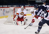 Goalie Henrik Karlsson (no.1) of Jokerit and Patrick Bjorkstrand (no.62) of KHL Medvescak during match of regular season Ice hockey KHL, Kontinental Hockey League, between KHL Medvescak Zagreb and Jokerit Helsinki. KHL ice hokey match between KHL Medvescak Zagreb, Croatia, and Jokerit Helsinki, Finland, was played in Dom Sportova Arena in Zagreb, Croatia, on Monday, 4th of January 2016.

