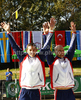 Third placed David Florence and Richard Hounsow of Great Britain celebrate their medals won in men C-2 race of ICF Canoe Slalom World Championships 2010, which was held in Tacen, Slovenia, on Saturday, 11th of September 2010.
