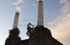A competitor in action during a training session for the Red Bull X-Fighters Moto X event held at Battersea Power Station in London, England, on 12th of August 2010.
