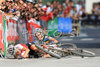 Christoph Sauser of Switzerland, right, crashes with Roel Paulissen of Belgium at the finish sprint of the 2008 UCI Mountain Bike Marathon World Championships at Villabassa, Italy, Saturday, July 5, 2008. Paulissen won ahead of Sauser.
