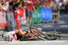 Roel Paulissen of Belgium, left, and Christoph Sauser of Switzerland after crashing at the finish sprint of the 2008 UCI Mountain Bike Marathon World Championships at Villabassa, Italy, Saturday, July 5, 2008. Paulissen won ahead of Sauser.

