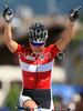 Sabine Spitz of Germany reacts as she passes the finish line at the 2008 UCI Mountain Bike Marathon World Championships at Villabassa, Italy, Saturday, July 5, 2008. Spitz placed second. <br> 
