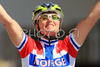 Gunn-Rita Dahle Flesjaa of Norway reacts as she passes first the finish line of the 2008 UCI Mountain Bike Marathon World Championships at Villabassa, Italy, Saturday, July 5, 2008. <br> 
