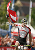 Second placed Alban Lakata of Austria celebrates his medal in men UCI Mountain bike Marathon World Championships race in Graz - Stattegg, Austria. 104km long men race was held in Graz - Stattegg, Austria, on 23rd of August 2009.
