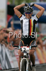 Winner Sabine Spitz of Germany celebrates her victory in women UCI Mountain bike Marathon World Championships race in Graz - Stattegg, Austria. 84km long race was held in Graz - Stattegg, Austria, on 23rd of August 2009.
