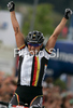 Winner Sabine Spitz of Germany celebrates her victory in women UCI Mountain bike Marathon World Championships race in Graz - Stattegg, Austria. 84km long race was held in Graz - Stattegg, Austria, on 23rd of August 2009.
