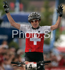 Second placed Esther Suss of Switzerland celebrates her medal in during women UCI Mountain bike Marathon World Championships race in Graz - Stattegg, Austria. 84km long race was held in Graz - Stattegg, Austria, on 23rd of August 2009.
