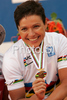 Winner Sabine Spitz of Germany celebrate her medal won in women UCI Mountain bike Marathon World Championships race in Graz - Stattegg, Austria. 84km long race was held in Graz - Stattegg, Austria, on 23rd of August 2009.
