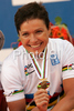 Winner Sabine Spitz of Germany celebrate her medal won in women UCI Mountain bike Marathon World Championships race in Graz - Stattegg, Austria. 84km long race was held in Graz - Stattegg, Austria, on 23rd of August 2009.
