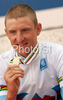 Winner Roel Paulissen of Belgium celebrate his medal won in UCI Mountain bike Marathon World Championships race in Graz - Stattegg, Austria. 104km long men race was held in Graz - Stattegg, Austria, on 23rd of August 2009.
