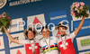 Winner Sabine Spitz of Germany (M), second placed Esther Suss of Switzerland (L) and third placed Petra Henzi of Switzerland (R) celebrate their medals won in women UCI Mountain bike Marathon World Championships race in Graz - Stattegg, Austria. 84km long race was held in Graz - Stattegg, Austria, on 23rd of August 2009.
