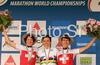 Winner Sabine Spitz of Germany (M), second placed Esther Suss of Switzerland (L) and third placed Petra Henzi of Switzerland (R) celebrate their medals won in women UCI Mountain bike Marathon World Championships race in Graz - Stattegg, Austria. 84km long race was held in Graz - Stattegg, Austria, on 23rd of August 2009.
