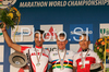 Winner Roel Paulissen of Belgium (M), second placed Alban Lakata of Austria (L) and third placed Christoph Sauser of Switzerland (R) celebrate their medals won in UCI Mountain bike Marathon World Championships race in Graz - Stattegg, Austria. 104km long men race was held in Graz - Stattegg, Austria, on 23rd of August 2009.
