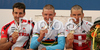 Winner Roel Paulissen of Belgium (M), second placed Alban Lakata of Austria (L) and third placed Christoph Sauser of Switzerland (R) celebrate their medals won in UCI Mountain bike Marathon World Championships race in Graz - Stattegg, Austria. 104km long men race was held in Graz - Stattegg, Austria, on 23rd of August 2009.
