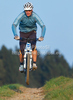 Mountain biker riding his bike through fields near his home city of Kranj, Slovenia, on late autumn afternoon of Sunday, 10th of October 2010.

