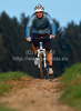 Mountain biker riding his bike through fields near his home city of Kranj, Slovenia, on late autumn afternoon of Sunday, 10th of October 2010.
