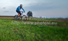 Mountain biker riding his bike through fields near his home city of Kranj, Slovenia, on late autumn afternoon of Sunday, 10th of October 2010.
