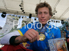 Winner Nick Beer of Switzerland celebrate his medal won in Mountain Bike Downhill European Championships in Kranjska Gora, Slovenia. MTB Downhill European Championships was held on Sunday, 14th of June 2009 in Kranjska Gora, Slovenia.

