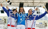 Winner Floriane Pugin of France (M), second placed Emmeline Ragot of France (L) and third placed Celine Gros of France (R) celebrate their medals won in Women Elite Mountain Bike Downhill European Championships in Kranjska Gora, Slovenia. MTB Downhill European Championships was held on Sunday, 14th of June 2009 in Kranjska Gora, Slovenia.
