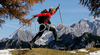 Nordicwalking in mountains near Vrsic, Slovenia. Central Julian Alps with Skrlatica, Prisojnik, Kukova spica and Vrsic are seen from 1909m high Slemenova Spica. Fall brought first snow in mountains around Vrsic, Slovenia. Trees in mountains above Kranjska gora, Slovenia, painted their leaves into colorful fall colors, while first snow in mountains put some more contrast to already beautiful and peaceful landscape.

