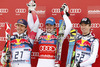 Winner Dominik Paris of Italy (middle), second placed Erik Guay of Canada (left) and third placed Hannes Reichelt of Austria (right) celebrate thier medals won in the Men Downhill race of Audi FIS alpine skiing World Cup in Kitzbuehel, Austria. Downhill race of Men Audi FIS Alpine skiing World Cup 2012-2013, was held on Saturday, 26th of January, 2013, on  course Streifalm in Kitzbuehel, Austria.
