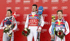Winner Dominik Paris of Italy (middle), second placed Erik Guay of Canada (left) and third placed Hannes Reichelt of Austria (right) celebrate thier medals won in the Men Downhill race of Audi FIS alpine skiing World Cup in Kitzbuehel, Austria. Downhill race of Men Audi FIS Alpine skiing World Cup 2012-2013, was held on Saturday, 26th of January, 2013, on  course Streifalm in Kitzbuehel, Austria.

