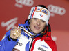 Winner Marion Rolland of France celebrates her medal won in the Ladies Downhill race of Fis Alpine World Ski Championships 2013 Schladming, Austria. Ladies Downhill race of Fis Alpine World Ski Championships 2013 Schladming, was held on Sunday, 10th of February, 2013, on  course Streicher in Schladming, Austria.
