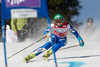 Denise Karbon of Italy clears a gate in the first run of FIS women alpine skiing World Cup giant slalom race in Ofterschwang, Germany. Giant slalom World cup race in Ofterschwang, Germany, was held on 26th of January 2008.
