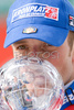 Manfred Moelgg of Italy kisses the crystal ball trophy of the mens slalom discipline title at the alpine ski World Cup finals in Bormio, Italy, Saturday, March 15, 2008.
