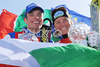 Manfred Moelgg of Italy, left, and teammate Denise Karbon pose with their crystal ball trophy at the alpine ski World Cup finals in Bormio, Italy, Saturday, March 15, 2008.
