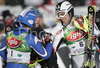 Winner Mario Matt of Austria (R) accepting congratulations from third placed Manfred Moelgg of Italy (L) in finish of second run of men slalom World Cup race in Schladming, Austria. Slalom race of traditional Schladming Night race and Men FIS Alpine skiing World Cup was held in Schladming, Austria, on 22nd of January 2008.
