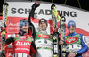 Winner Mario Matt of Austria (M), second placed Jean-Baptiste Grange of France (L), and third placed Manfred Moelgg of Italy (R) celebrate their medals won in men slalom World Cup race in Schladming, Austria. Slalom race of traditional Schladming Night race and Men FIS Alpine skiing World Cup was held in Schladming, Austria, on 22nd of January 2008.
