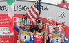 Winner Ted Ligety of USA (M), second placed Manfred Moelgg of Italy (L) and third placed Massimiliano Blardone of Italy (R) celebrate their medals won in men giant slalom World Cup race in Kranjska Gora, Slovenia. Giant slalom race of Men FIS Alpine skiing World Cup was held in Kranjska Gora, Slovenia, on 8th of March 2008.
