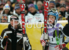 Winner Kathrin Zettel of Austria (R) and third placed Lara Gut of Switzerland (L) waiting for leader after first run, Manuela Moelgg of Italy in finish of second run of Semmering women giant slalom race of Audi FIS Ski World Cup 2008-09. Giant slalom race of Women Audi FIS Ski World Cup 2008-09 was held Semmering, Austria, on Sunday, 28th of December 2008.
