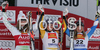 Winner Gina Stechert of Germany (M), second placed Lindsey Vonn of USA (L) and third placed Anja Paerson of Sweden (R) celebrate their medals won in Women Downhill race of Tarvisio Audi FIS Ski World Cup 2008-09. Downhill race of Women Audi FIS Ski World Cup 2008-09 was held in Tarvisio, Italy on Saturdayday, 21st of February 2009.
