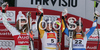 Winner Gina Stechert of Germany (M), second placed Lindsey Vonn of USA (L) and third placed Anja Paerson of Sweden (R) celebrate their medals won in Women Downhill race of Tarvisio Audi FIS Ski World Cup 2008-09. Downhill race of Women Audi FIS Ski World Cup 2008-09 was held in Tarvisio, Italy on Saturdayday, 21st of February 2009.
