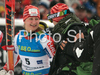 Third placed Tanja Poutiainen of Finland (L) celebrates her medal won in Women giant slalom race of Ofterschwang Audi FIS Ski World Cup 2008-09 together with her coach Janez Slivnik (R). Giant slalom race of Women Audi FIS Ski World Cup 2008-09 was held in Ofterschwang, Germany, on Friday, 6th of March 2009.
