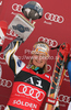 Winner Tanja Poutiainen of Finland celebrates her medal won in first Women GS FIS Alpine ski World Cup 2009-2010 race in Soelden, Austria. First giant slalom race of Women FIS Alpine ski World Cup was held on Rettenbach glacier above Soelden, Austria on 24th of October 2009.
