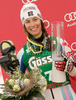 Second placed Sandrine Aubert of France celebrates her medal won in women slalom World Cup race in Lienz, Austra. Slalom race of Women Audi FIS Alpine skiing World Cup 2009-10 was held in Lienz, Austria, on 29th of December 2009.
