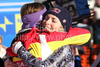 Maria Riesch, left, of Germany hugs Lindsey Vonn of the United States at the end of the womens Ski World Cup Downhill race in Cortina d Ampezzo, Italy, Saturday, January 23, 2010.
