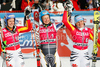 From left: Second placed Viktoria Rebensburg of Germany, winner Tanja Poutiainen of Finland and third placed Kathrin Hoelzl of Germany celebrate in the finish area after the womens alpine ski World Cup Giant Slalom race in Cortina dAmpezzo, Italy, Sunday, January 24, 2010.
